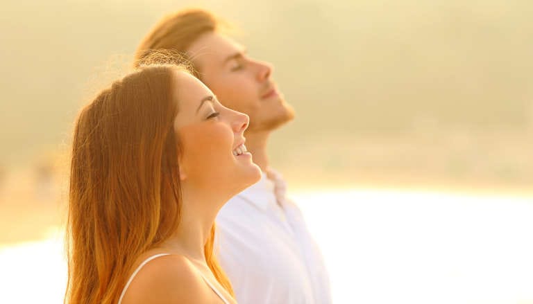 Couple Breathing Together Outside