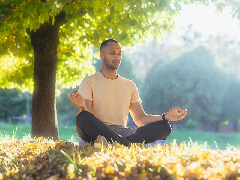 Man Meditating Outside
