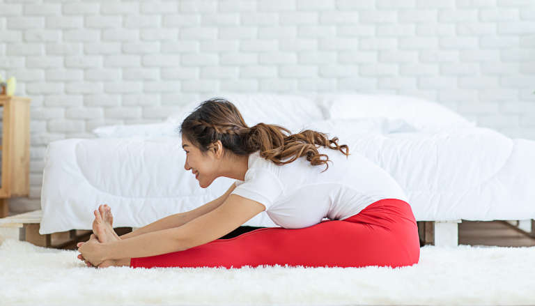 Yoga Seated Forward Bend Pose (Paschimottanasana)