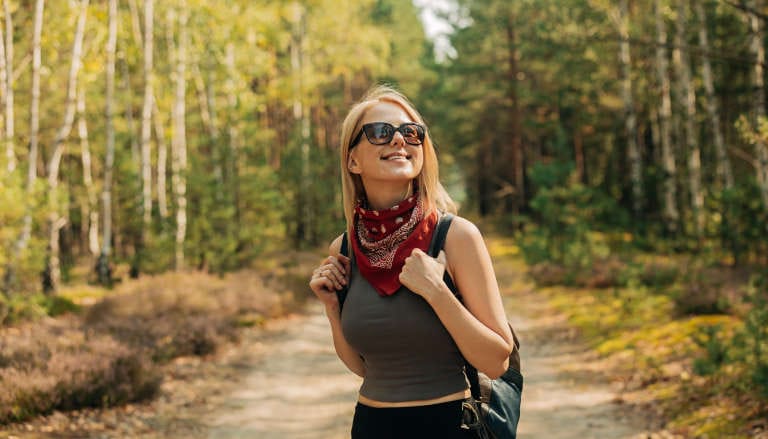 Smiling Lady Walking in Nature