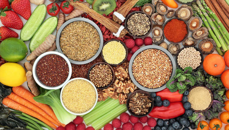 Diverse array of fruits, vegetables, grains, and nuts.